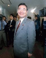 Kato beams on photographers